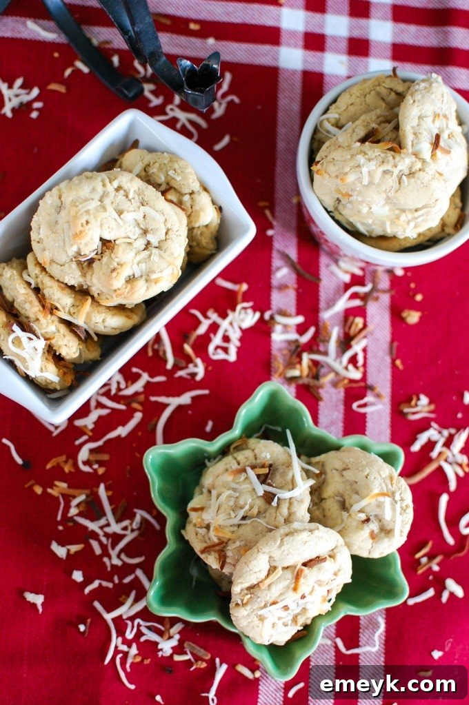 Ingredients laid out for making White Chocolate Toasted Coconut Cookies, emphasizing fresh and simple components.