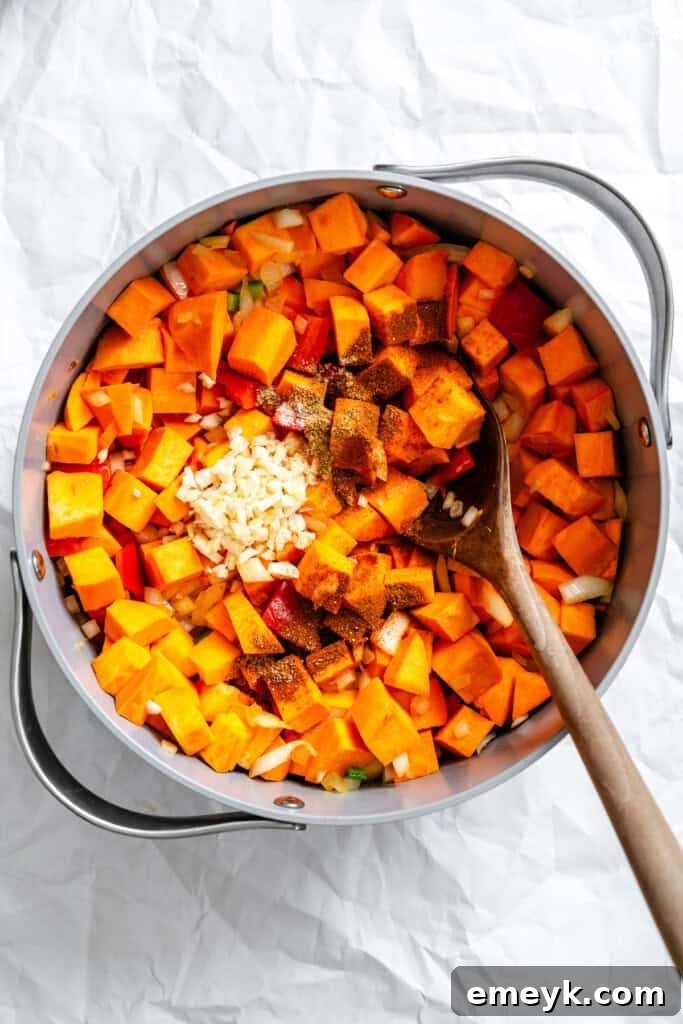 Hearty Sweet Potato Chili 9 Sweet Potato Chili sweet potatoes and spices in pot