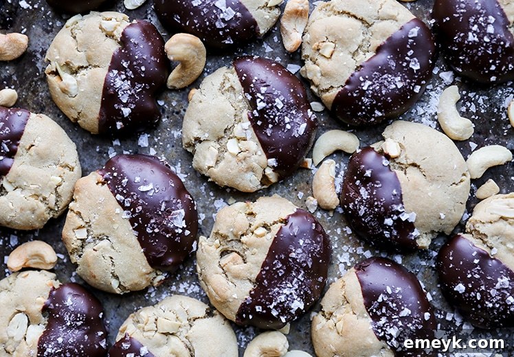 Irresistible Chocolate-Dipped Salted Cashew Cookies, a sweet and salty holiday delight.