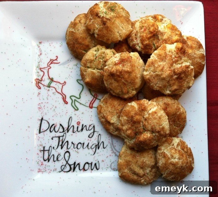 Classic Soft, Chewy Snickerdoodles, coated in cinnamon sugar, a beloved holiday comfort cookie.