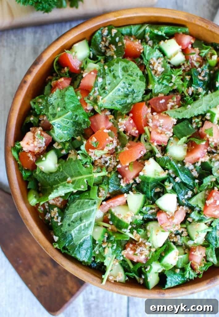 Kale Cucumber Tabbouleh in wood bowl