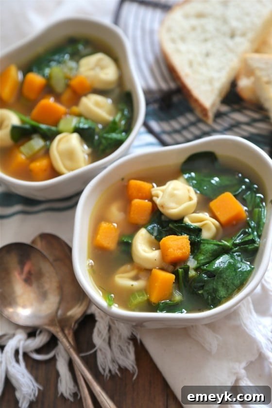 Comforting Butternut Squash Spinach and Tortellini Soup, a delightful and easy soup recipe for chilly evenings.