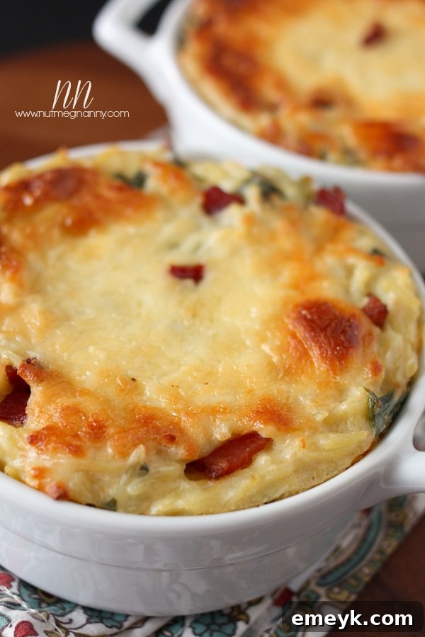 Orzo with Bacon and Greens in a creamy cauliflower cheese sauce, served in a bowl
