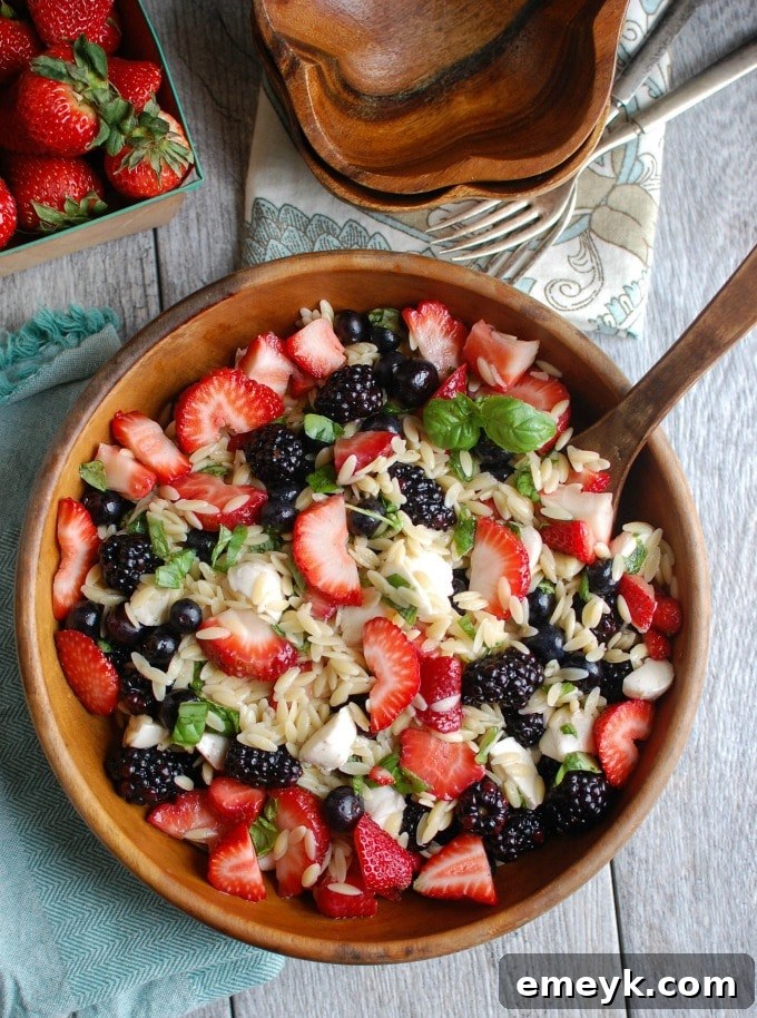 Delicious Mixed Berry Caprese Orzo Salad, a crowd-pleaser for any summer get-together