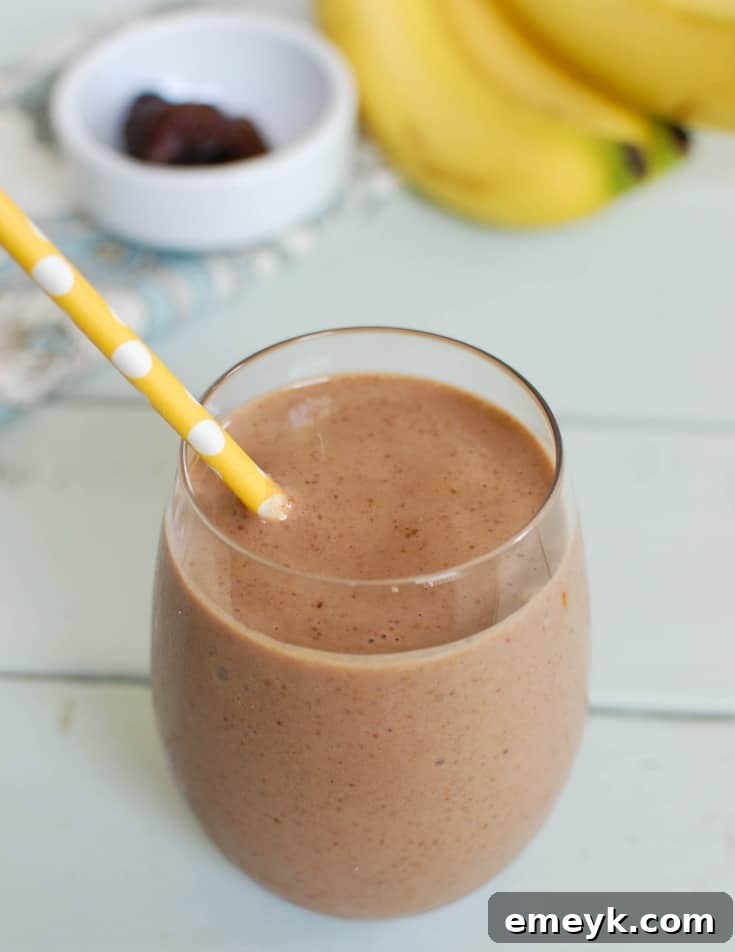Close-up of a Banana Date Smoothie, showcasing its smooth and inviting texture.
