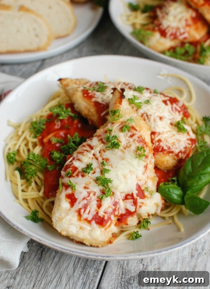 Golden Baked Chicken Parmesan 5 Baked Chicken Parmesan - easy dinner idea for families
