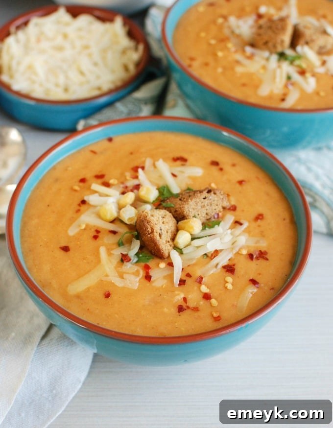 Cozy Cheesy Slow Cooker Potato Corn Chowder 3 Close-up of Slow Cooker Cheesy Potato Corn Chowder, ideal for a hearty dinner