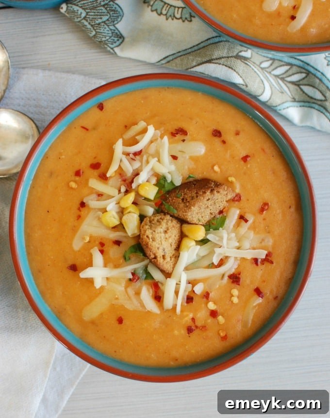 Cozy Cheesy Slow Cooker Potato Corn Chowder 4 Creamy and cheesy Slow Cooker Cheesy Potato Corn Chowder, a delightful texture
