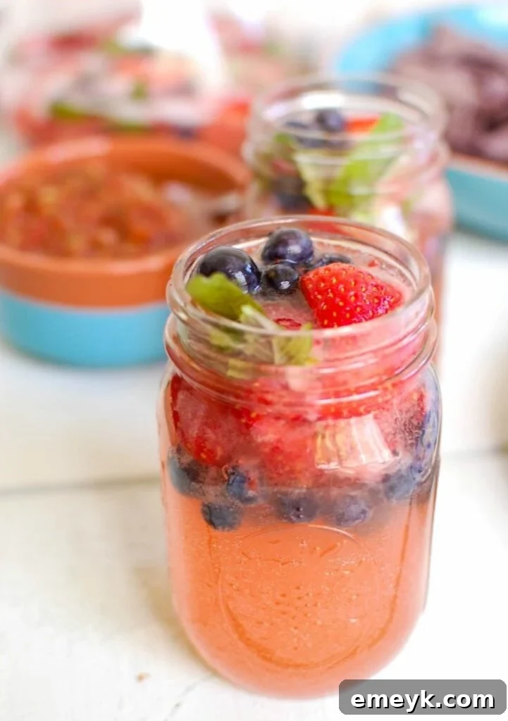 Strawberry Blueberry Lemonade Spritzer - a festive drink