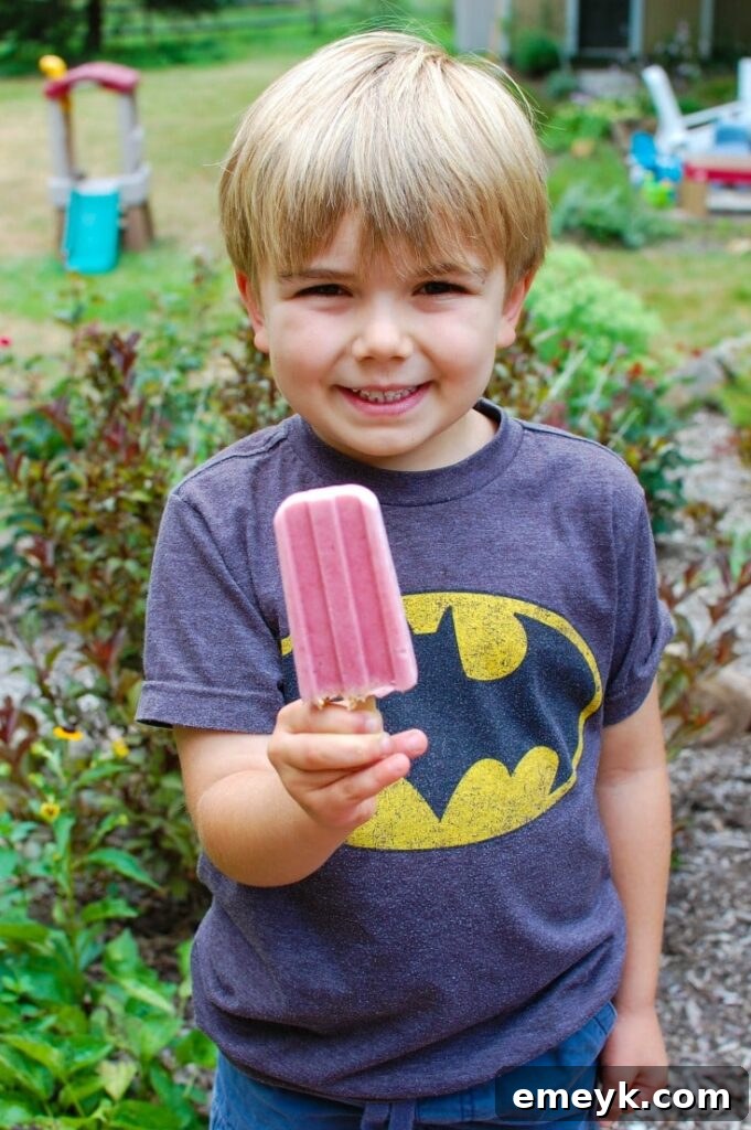 Creamy Strawberry Banana Yogurt Pops 4 Kids absolutely love these refreshing and sweet Strawberry Banana Yogurt Popsicles!