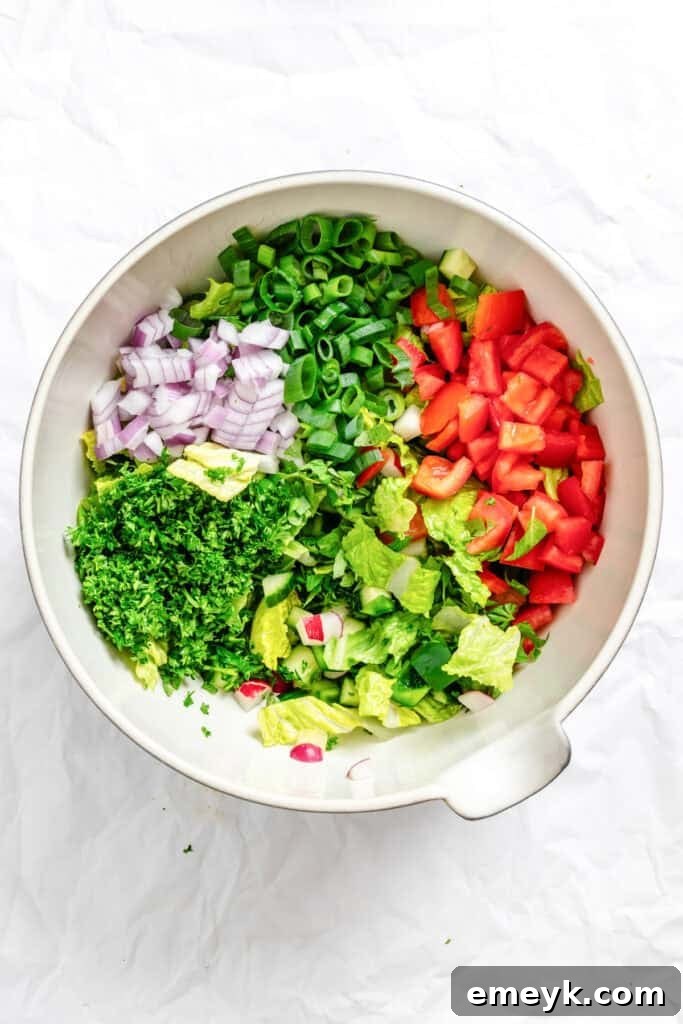 Fattoush Salad ingredients in a bowl