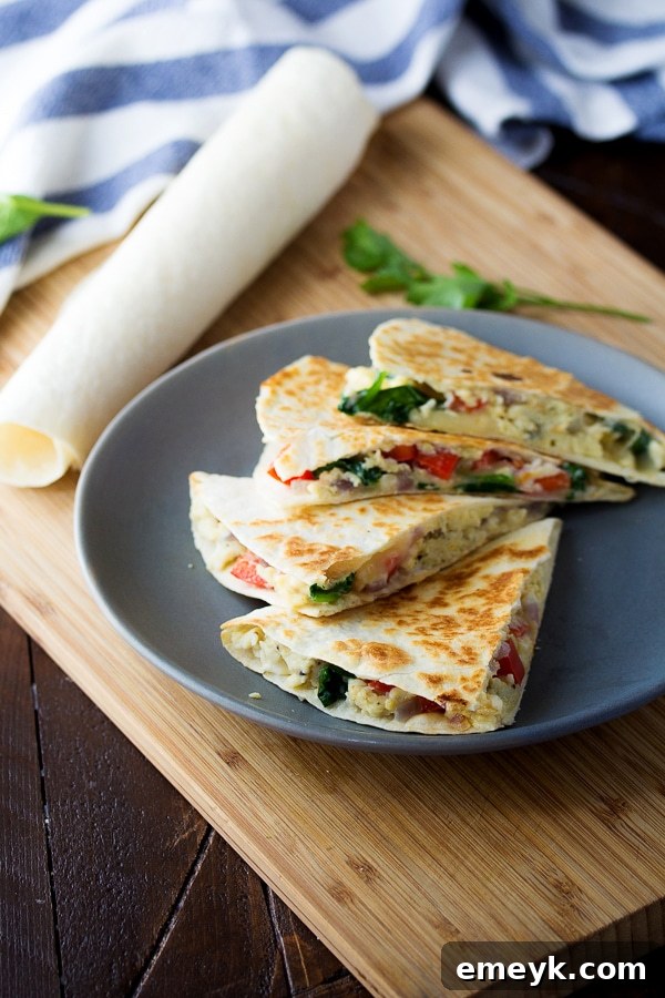 29 Brilliant Breakfasts for Effortless Mornings 7 Spinach Feta and Egg Breakfast Quesadilla, a savory make-ahead option from Sweet Peas & Saffron, great for meal prep.