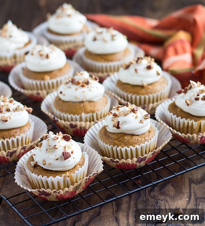 Easy Pumpkin Spice Cupcakes, frosted and garnished