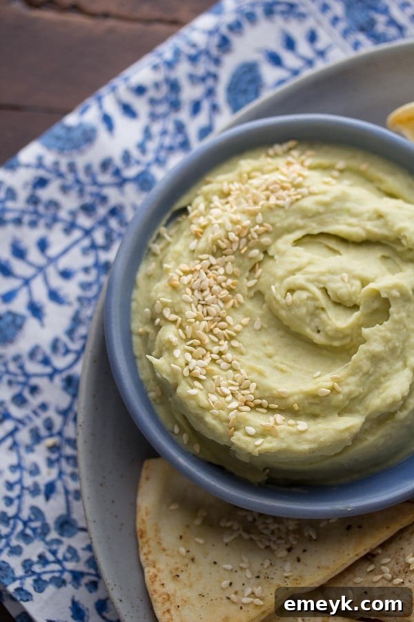 29 Unbeatable Game Day Dips 20 Avocado White Bean Dip with Wasabi and Ginger, a fusion of creamy and spicy flavors.