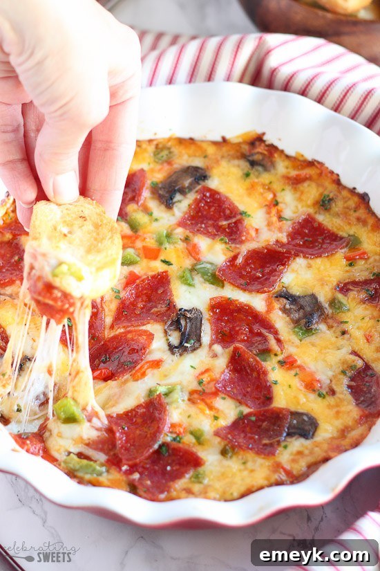 29 Unbeatable Game Day Dips 9 Delicious and comforting Pizza Dip, an easy appetizer for any gathering.
