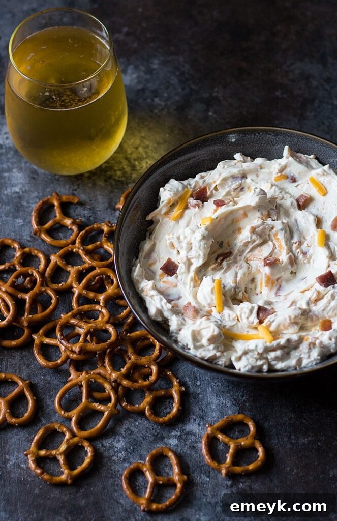 29 Unbeatable Game Day Dips 12 Irresistible Beer and Bacon Cheese Dip, a savory and addictive blend.