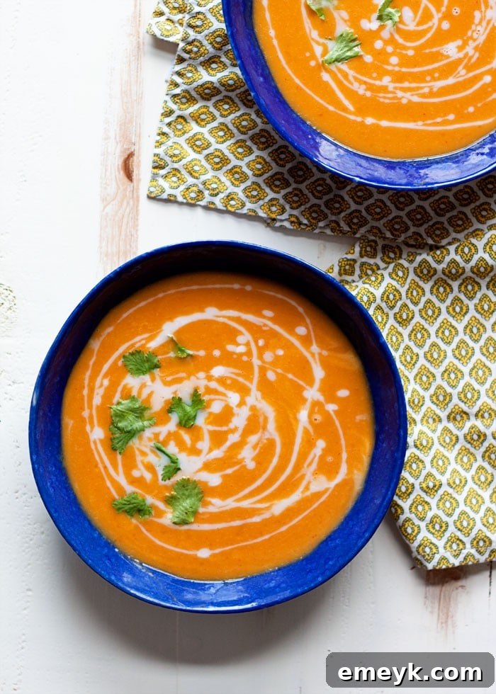 Slow Cooker Thai Curry Butternut Squash Soup, a vibrant and spicy dish