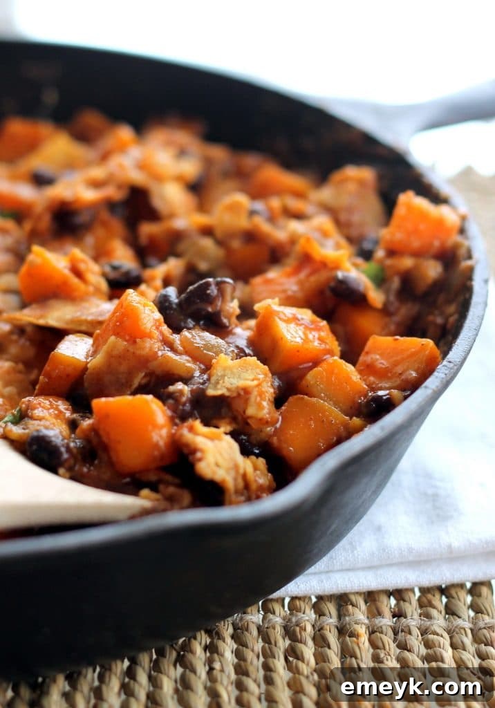 Butternut Squash and Black Bean Enchilada Skillet, bubbling hot and cheesy