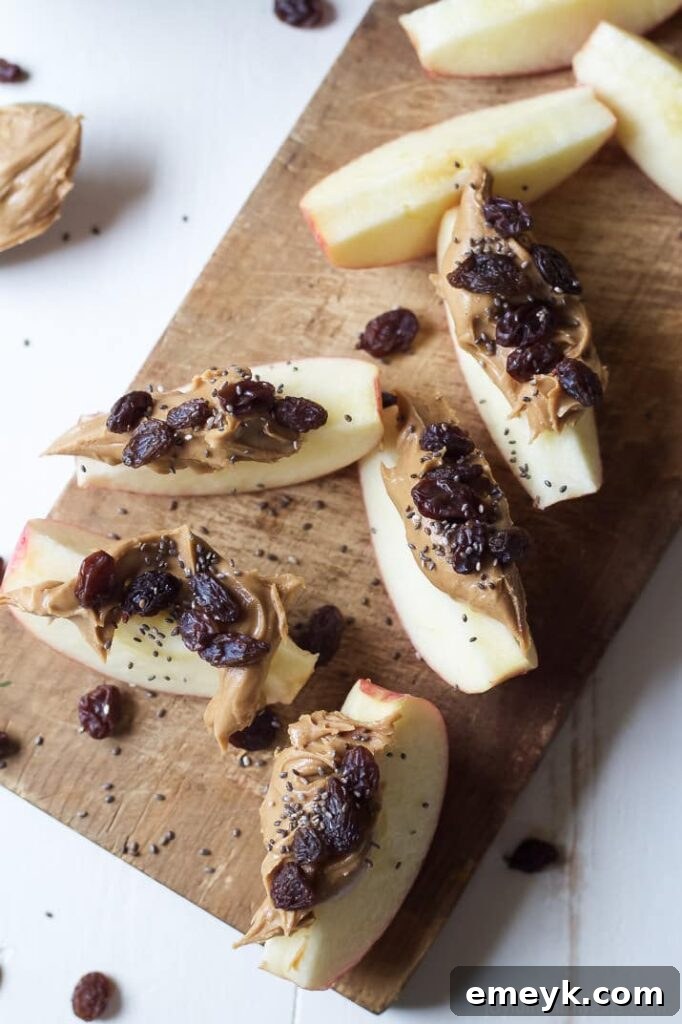 Healthy apple peanut butter energy bites, arranged on a plate, showing the combination of ingredients.