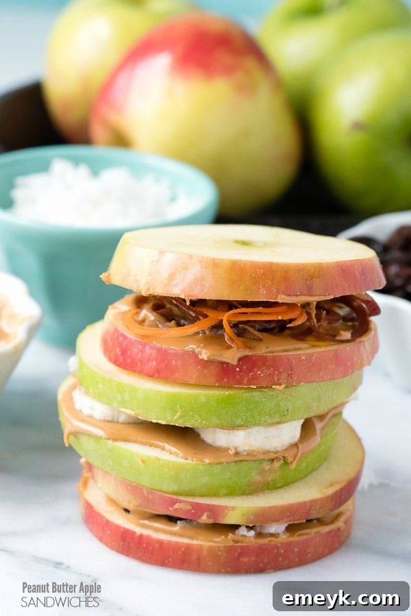Creative apple peanut butter sandwiches, made by slicing apples and spreading peanut butter between them.
