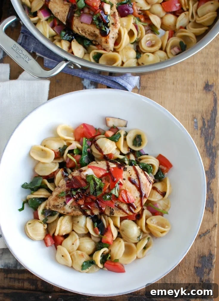 Bruschetta Chicken Orecchiette Pasta is a light and healthy dish, perfect for spring or summer. Boneless skinless chicken breasts are coated with a balsamic vinegar sauce and cooked in a skillet, topped with a fresh bruschetta mixture and paired with orecchiette pasta.