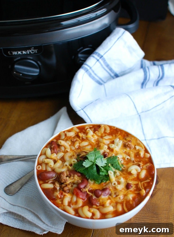 A large bowl of Crock-Pot Turkey Chili Mac and Cheese, visually appealing and ready to serve.