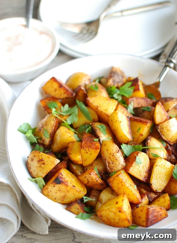 Smoky Paprika Roasted Potatoes with Zesty Yogurt Dip 2 Your favorite potatoes are tossed in olive oil and smoked paprika and roasted until they are soft on the inside and crispy on the outside paired with a creamy yogurt dipping sauce. These Paprika Roasted Potatoes with Spiced Yogurt Sauce make the perfect side dish to any meal.