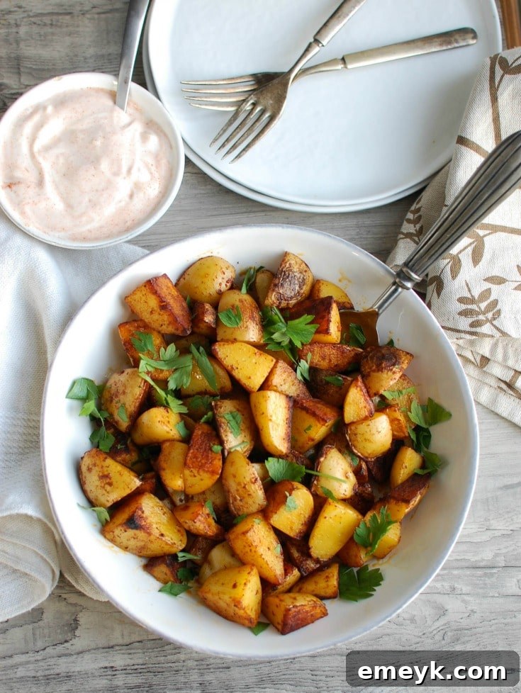 Smoky Paprika Roasted Potatoes with Zesty Yogurt Dip 4 Your favorite potatoes are tossed in olive oil and smoked paprika and roasted until they are soft on the inside and crispy on the outside paired with a creamy yogurt dipping sauce. These Paprika Roasted Potatoes with Spiced Yogurt Sauce make the perfect side dish to any meal.