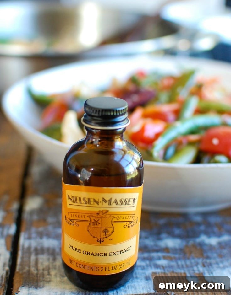 This Orange Chicken Vegetable Stir Fry is healthy, packed with a rainbow of vegetables and a light, sweet orange sauce. Forget take-out and make this version at home allowing you to customize it to your tastes! 