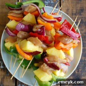 Hawaiian Chicken Kabobs on a white plate