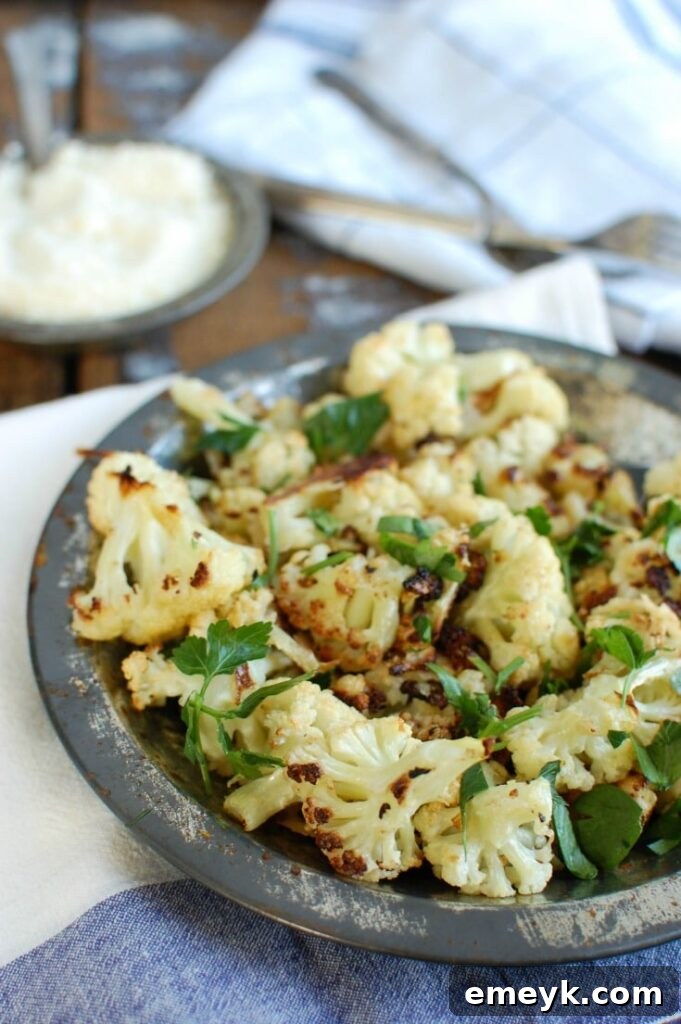 Roasted Parmesan Garlic Cauliflower makes a nice side dish to your dinner. Roasted cauliflower is sweet and pairs perfectly with garlic and cheese. 