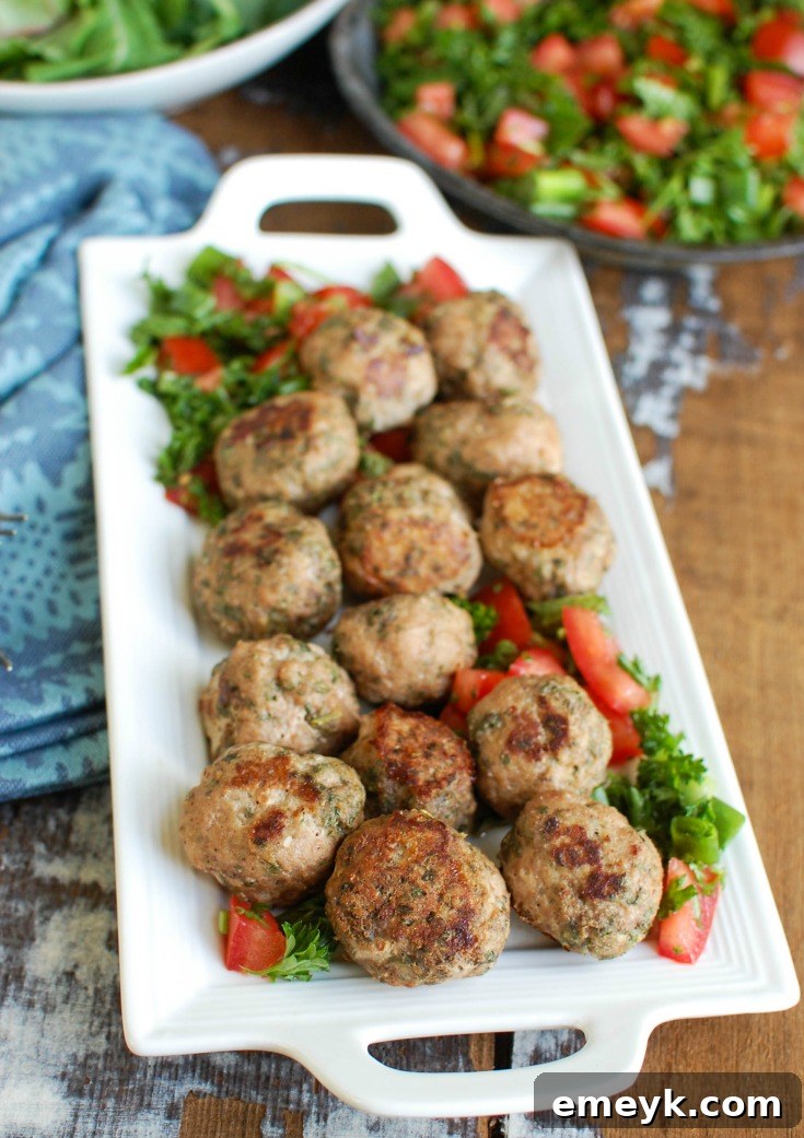 A platter showcasing freshly baked Mediterranean Turkey Meatballs, ready for a delicious meal.