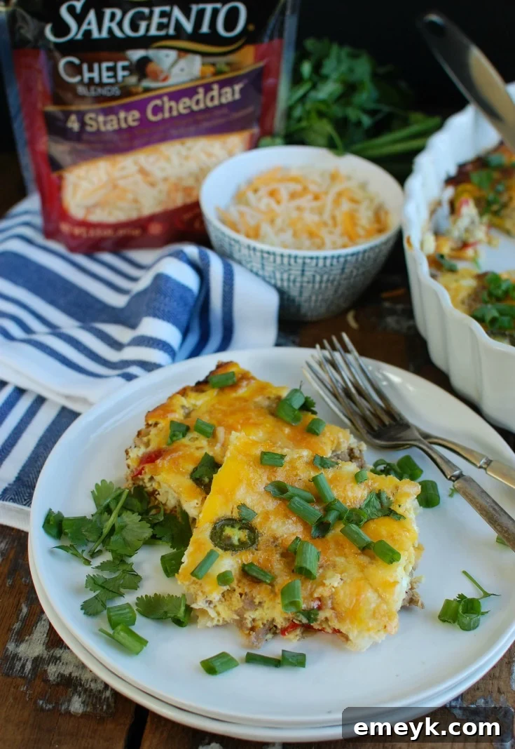 Southwestern Breakfast Casserole cut on a plate with forks.