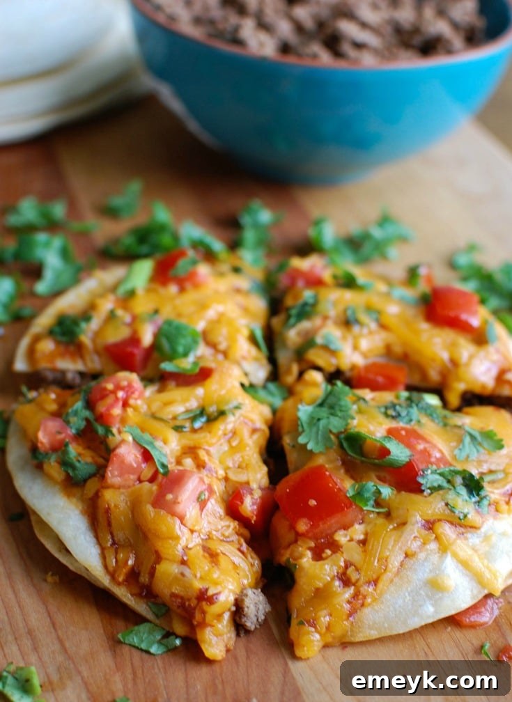 Cheesy Chicken and Broccoli Bake 11 A vibrant homemade Mexican Pizza, generously topped with seasoned ground beef, melted Sargento® Shredded Monterey Jack cheese, fresh tomatoes, green onions, and cilantro.