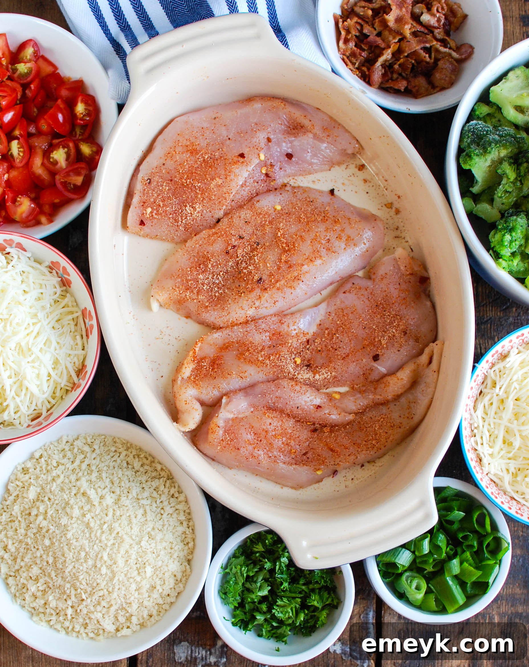 Cheesy Chicken and Broccoli Bake 4 A curated selection of ingredients for Baked Broccoli Cheese Chicken, prominently featuring Sargento® shredded cheeses, fresh broccoli, and cooked bacon.