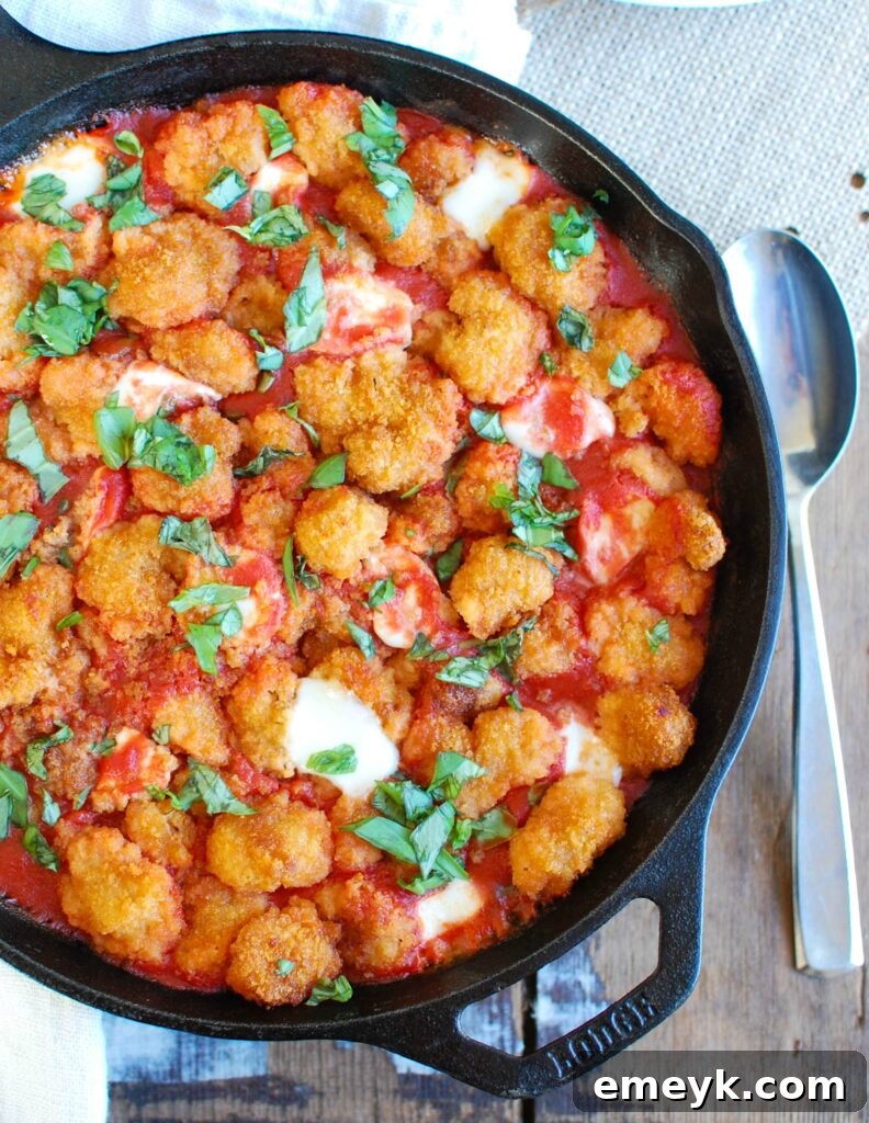 Tomato Basil Mozzarella Popcorn Shrimp Bites, a vibrant and easy appetizer perfect for holiday parties. Featuring crispy popcorn shrimp, fresh mozzarella, juicy tomatoes, and aromatic basil, this 4-ingredient recipe promises impressive flavor for any gathering.