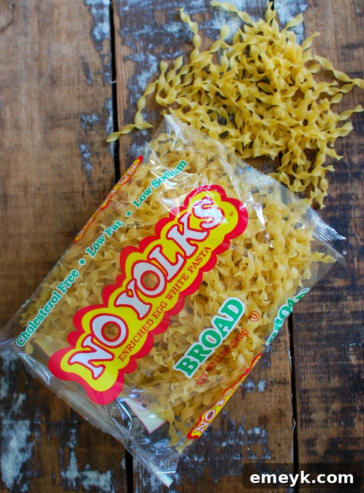 A diverse spread of dishes featuring No Yolks Noodles, from main courses to creative side dishes.