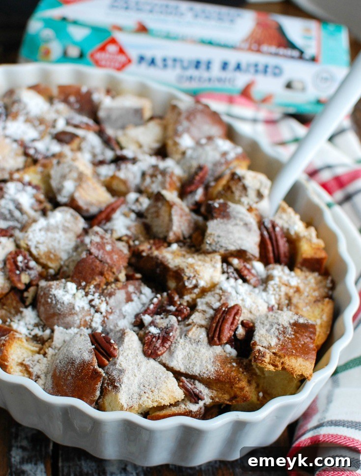 The Overnight Gingerbread French Toast Casserole, freshly baked and garnished, showcasing its golden-brown top and soft interior.