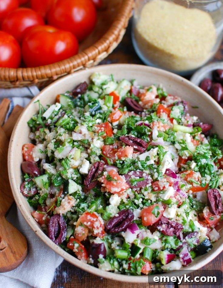 A beautifully presented bowl of Greek Tabbouleh salad, showcasing its vibrant colors and fresh ingredients.