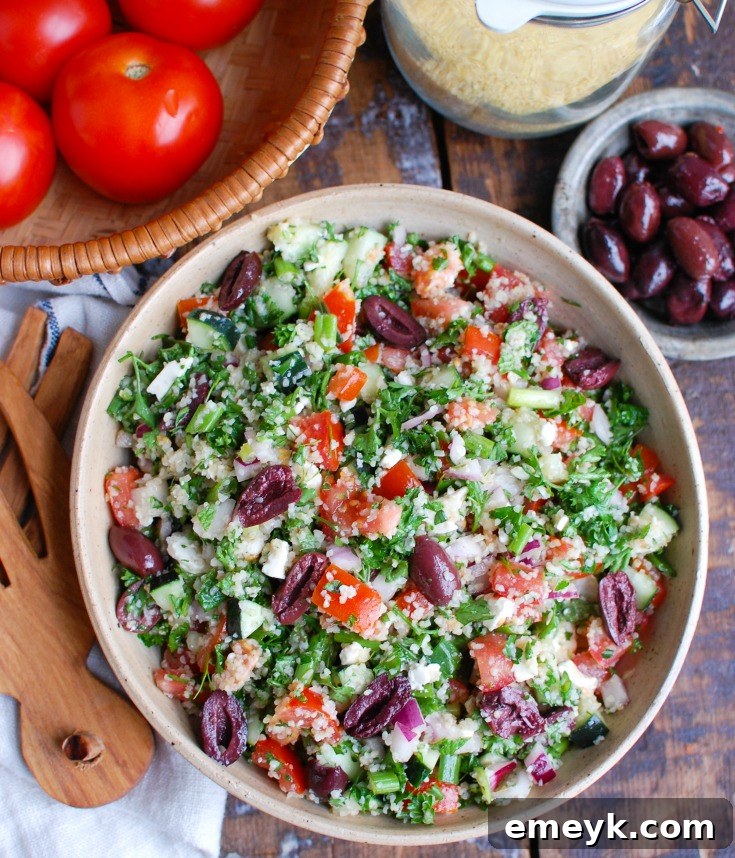An overhead shot of Greek Tabbouleh in a large bowl, emphasizing its fresh, vibrant appearance.