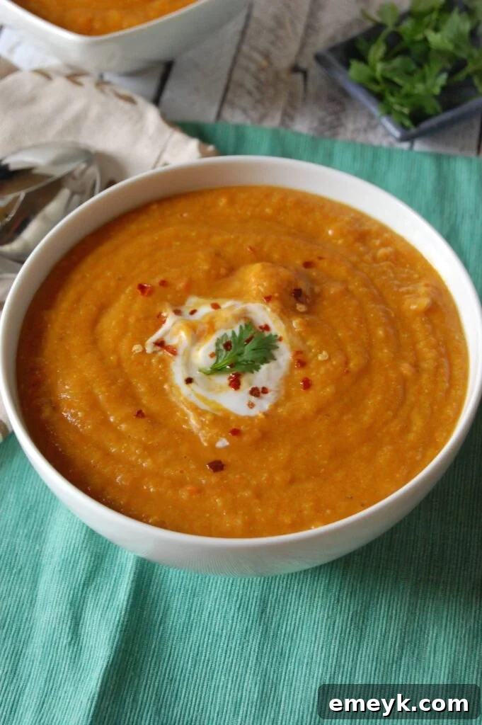 Instant Pot Lentil Soup garnished with fresh parsley.