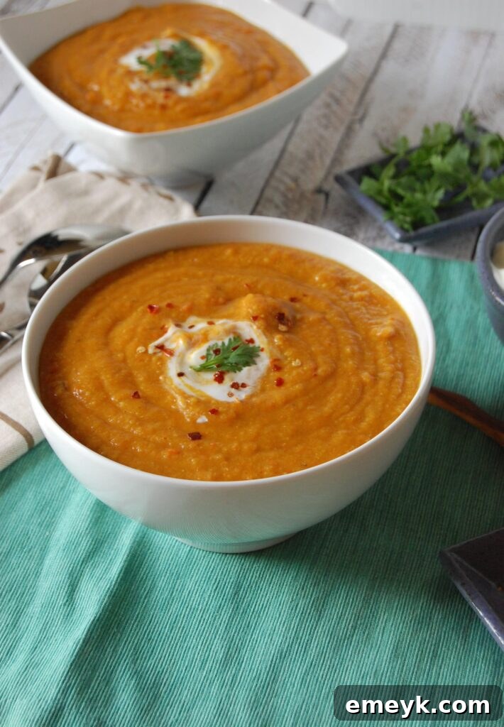 Two bowls of Instant Pot Lentil Soup, ready to be served.