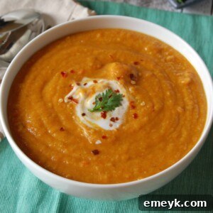 Instant Pot Lentil Soup garnished with fresh parsley.
