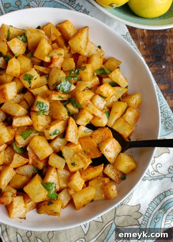 Spicy Lebanese Potatoes are crisp on the outside, tender on the inside and will spice up any meal. The sauce on these potatoes is the star featuring coriander, paprika, cayenne pepper mixed with olive oil and lemon juice. The dish is finished off with your favorite herb, cilantro or parsley.