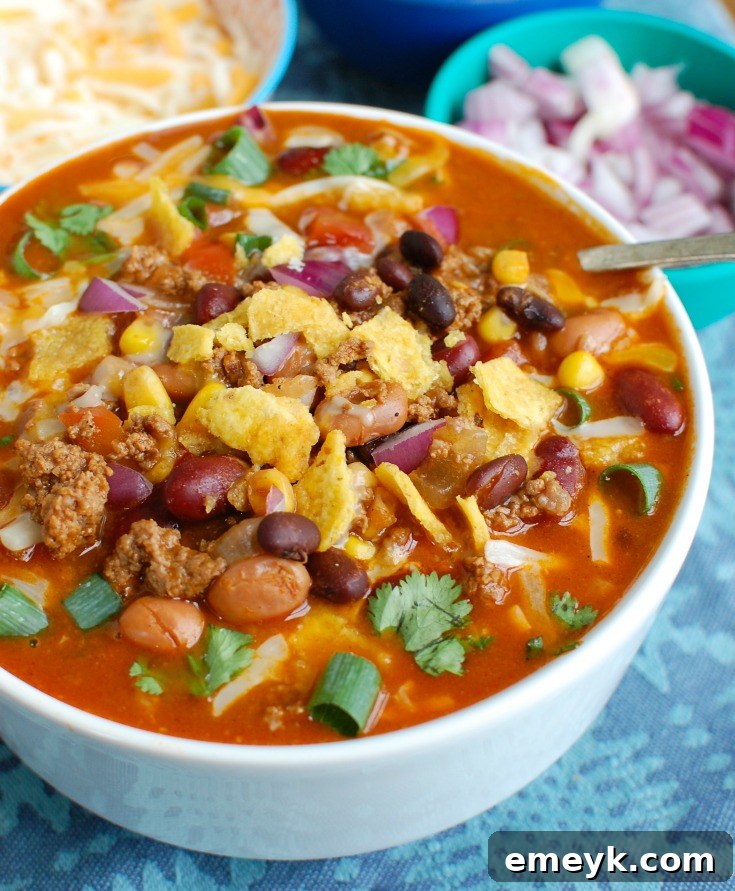 Zesty Instant Pot Taco Soup 72 A steaming bowl of Instant Pot Taco Soup garnished with fresh cilantro, ready to be enjoyed.