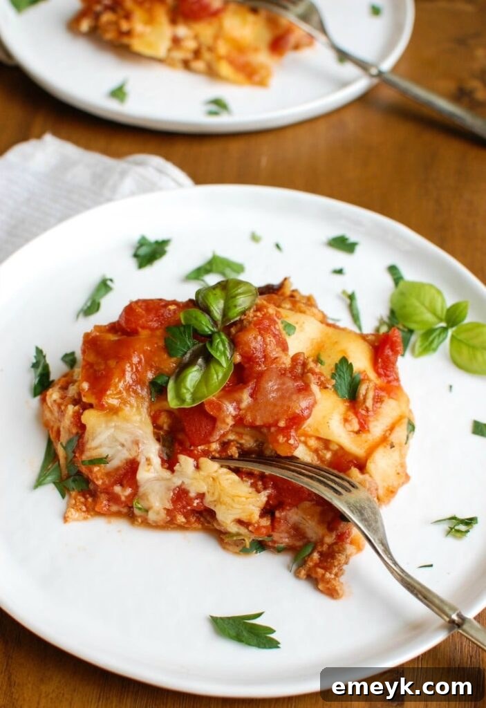 Effortless Slow Cooker Lasagna 2 Delicious Crock Pot Lasagna, perfectly cooked in a slow cooker, ready to be served.