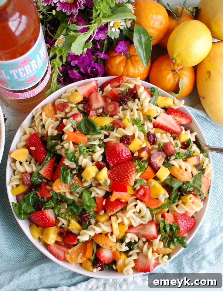 Bright Spring Pasta Salad 5 Overhead shot of the complete Spring Pasta Salad, showcasing all the colorful ingredients beautifully arranged in a large bowl.