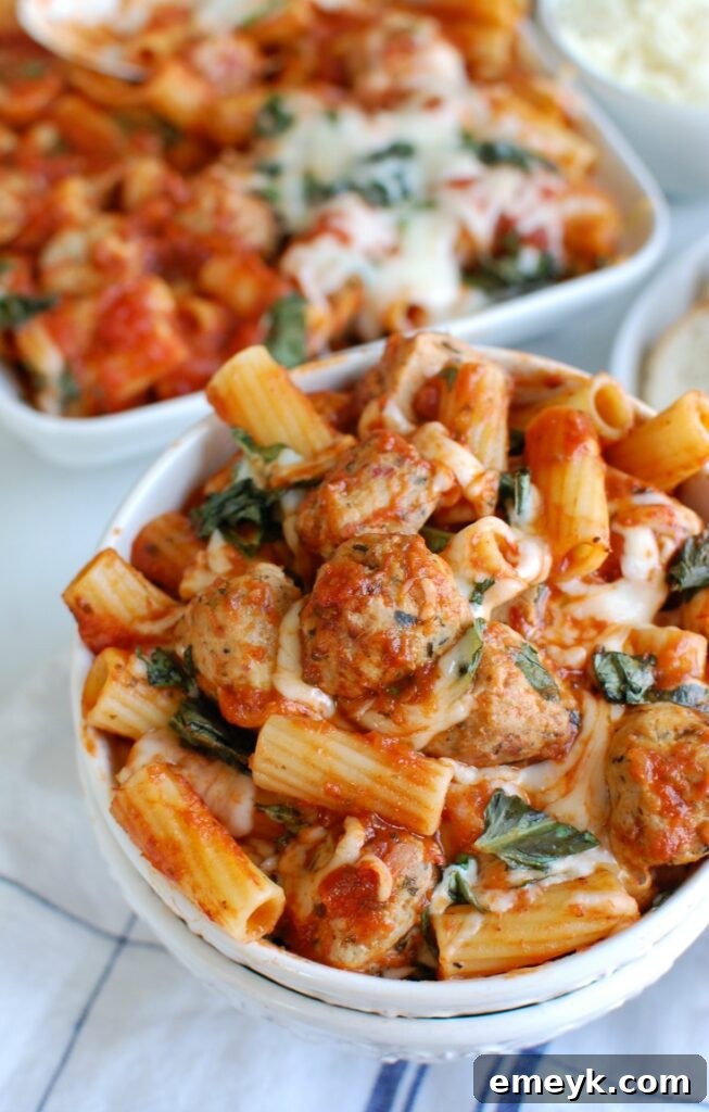 Hearty Chicken Meatball Rigatoni Casserole 4 Easy Baked Rigatoni with Chicken Meatballs in a baking dish, before baking
