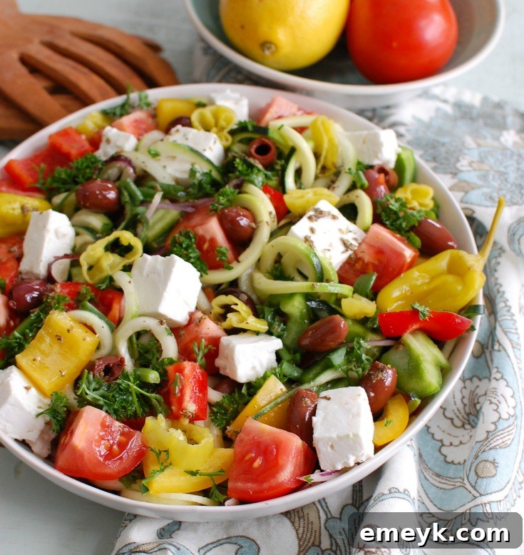 Close-up of Spiralized Greek Style Salad ingredients with zucchini noodles