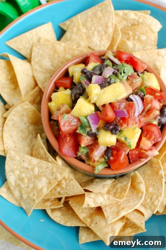 Mango and Black Bean Salsa in a blue ceramic bowl